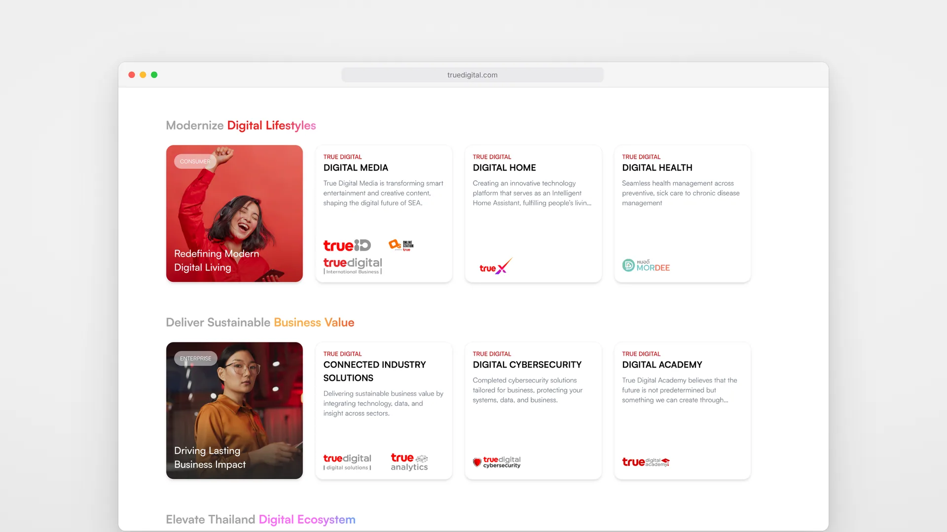 The home page on desktop: consumer and enterprise businesses as cards, each with its unit logos